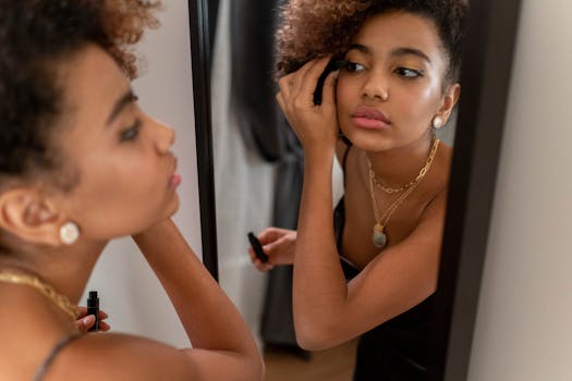 Confident woman doing make up. 